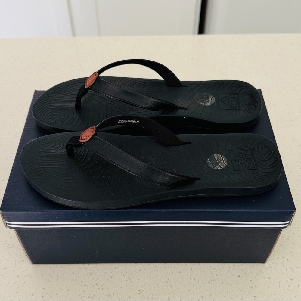 Reef Zen Love Women's Black Flip Flops with Brown Logo Accent